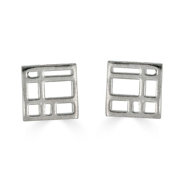 Pair of silver square earrings on a white background